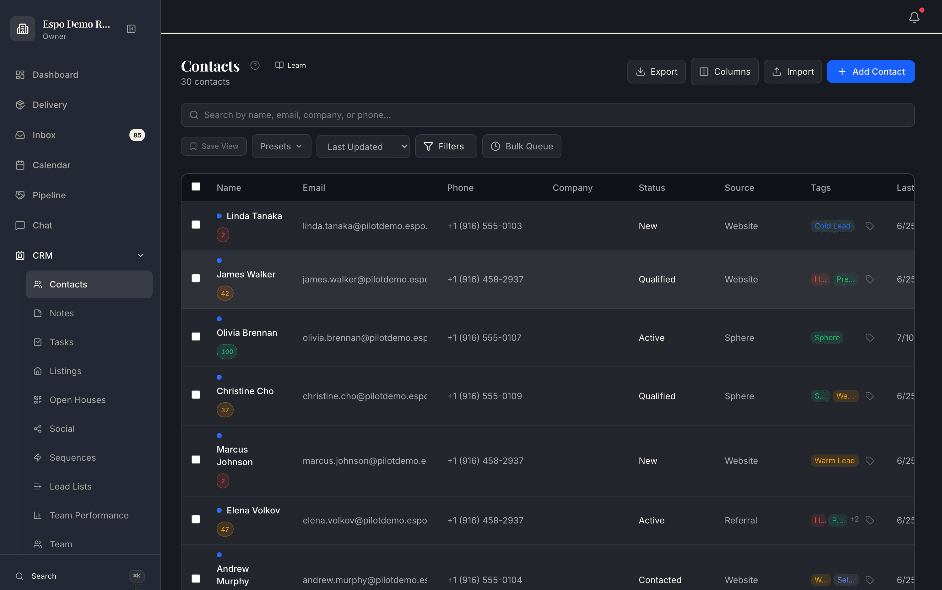 The Espo contacts list with lead scores, statuses, sources, and tags on every record.